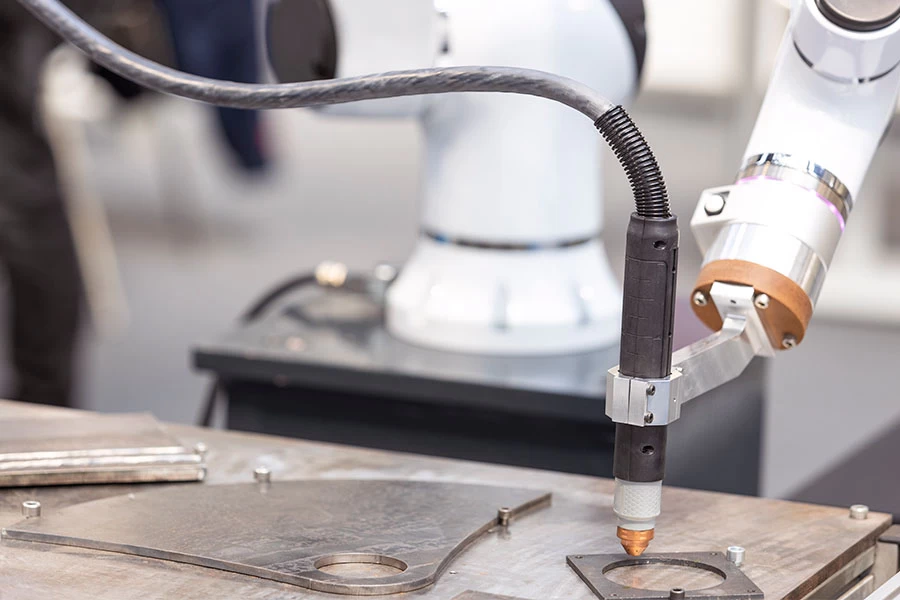 Laser welding and robotic arms